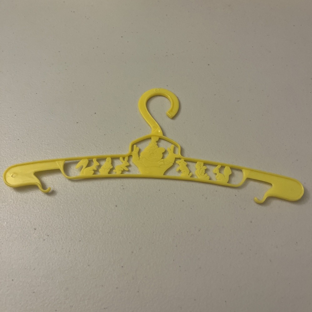 Vintage Yellow Plastic Baby Hanger 70s Clown, Woodland, Animals Creatures (1)